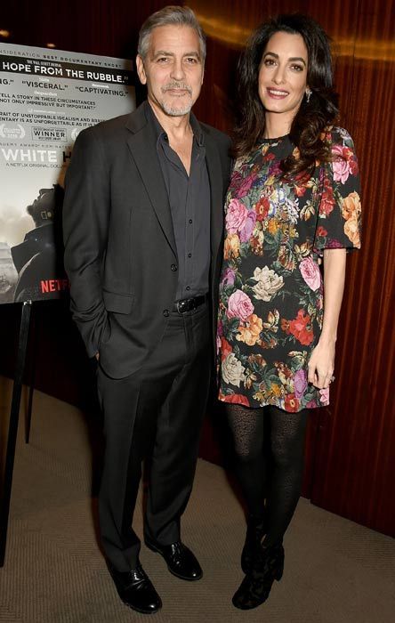 Är George Cloonys fru Amal gravid med tvillingar?