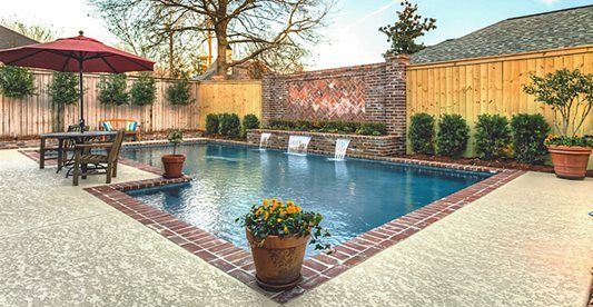 Pool Deck, Texrured, Waterfall Concrete Pool Decks Sundek Concrete Coatings, Inc. New Orleans, LA, Yhdysvallat